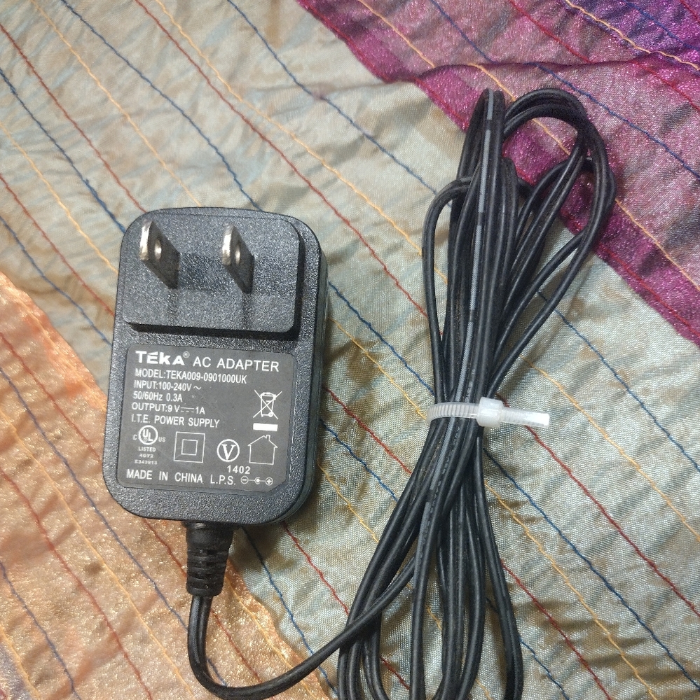 TEKA AC Adapter Model TEKA009-0901000UK. ( OUTPUT 9v )